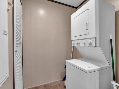 Nestled among the pines, this charming 2-bedroom, 2-bath turnkey on Rayburn Country Club in Texas - for sale on GolfHomes.com, golf home, golf lot