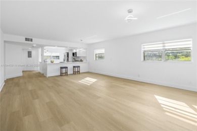 Stunning Fully Remodeled Corner Unit. Spacious & Elegant! on Flamingo Lakes Country Club in Florida - for sale on GolfHomes.com, golf home, golf lot
