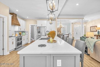 Tucked away on a quiet cul-de-sac in sought after Brunswick on Cape Fear National At Brunswick Forest in North Carolina - for sale on GolfHomes.com, golf home, golf lot