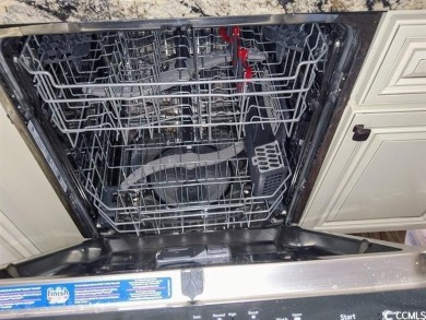This is not your average Myrtle Beach condo. The location is on  in South Carolina - for sale on GolfHomes.com, golf home, golf lot