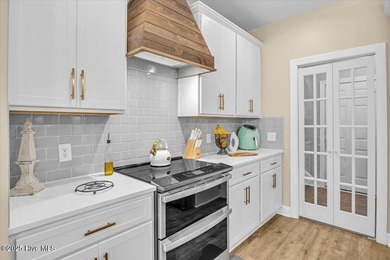 Tucked away on a quiet cul-de-sac in sought after Brunswick on Cape Fear National At Brunswick Forest in North Carolina - for sale on GolfHomes.com, golf home, golf lot