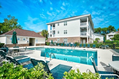 You will love this beautiful top floor end unit offering 2 on Barefoot Resort and Golf Club  in South Carolina - for sale on GolfHomes.com, golf home, golf lot