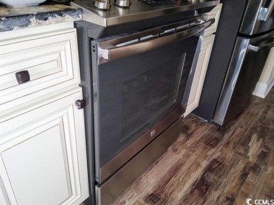This is not your average Myrtle Beach condo. The location is on  in South Carolina - for sale on GolfHomes.com, golf home, golf lot
