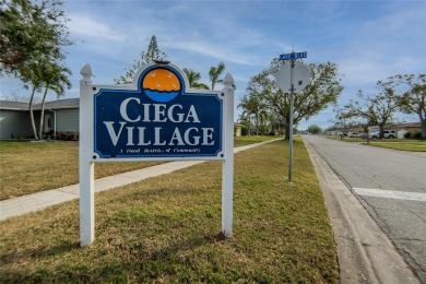 Welcome to this inviting Florida 2-bedroom, 2-bathroom home on Mainlands Golf Club in Florida - for sale on GolfHomes.com, golf home, golf lot