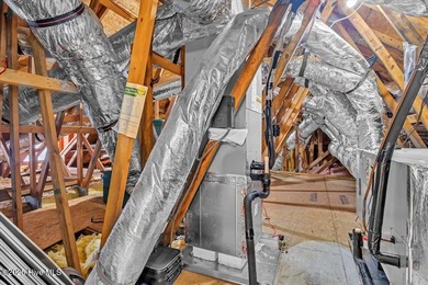 Tucked away on a quiet cul-de-sac in sought after Brunswick on Cape Fear National At Brunswick Forest in North Carolina - for sale on GolfHomes.com, golf home, golf lot