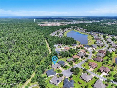 Tucked away on a quiet cul-de-sac in sought after Brunswick on Cape Fear National At Brunswick Forest in North Carolina - for sale on GolfHomes.com, golf home, golf lot
