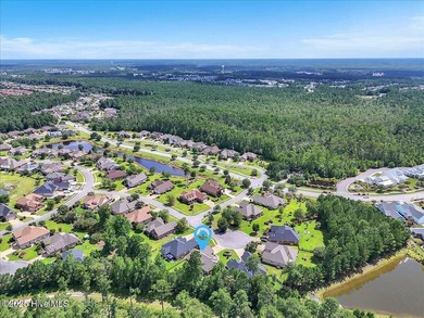 Tucked away on a quiet cul-de-sac in sought after Brunswick on Cape Fear National At Brunswick Forest in North Carolina - for sale on GolfHomes.com, golf home, golf lot