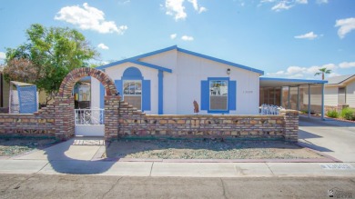 Foothills home with mountain views! This spacious doublewide on Las Barrancas Golf Course in Arizona - for sale on GolfHomes.com, golf home, golf lot