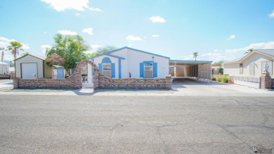 Foothills home with mountain views! This spacious doublewide on Las Barrancas Golf Course in Arizona - for sale on GolfHomes.com, golf home, golf lot