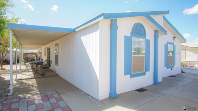 Foothills home with mountain views! This spacious doublewide on Las Barrancas Golf Course in Arizona - for sale on GolfHomes.com, golf home, golf lot