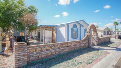 Foothills home with mountain views! This spacious doublewide on Las Barrancas Golf Course in Arizona - for sale on GolfHomes.com, golf home, golf lot