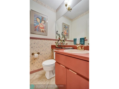 Distinctively Designed Total Custom 5 bedrooms, 3.5 Bath located on Country Club of Coral Springs in Florida - for sale on GolfHomes.com, golf home, golf lot
