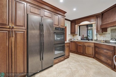Distinctively Designed Total Custom 5 bedrooms, 3.5 Bath located on Country Club of Coral Springs in Florida - for sale on GolfHomes.com, golf home, golf lot