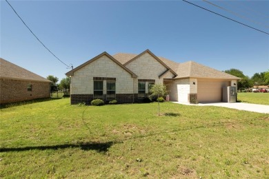 This barely lived in and beautifully maintained three bedroom on The Club At Runaway Bay in Texas - for sale on GolfHomes.com, golf home, golf lot
