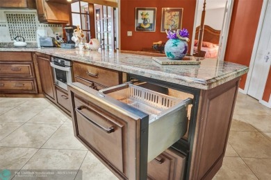 Distinctively Designed Total Custom 5 bedrooms, 3.5 Bath located on Country Club of Coral Springs in Florida - for sale on GolfHomes.com, golf home, golf lot