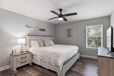 Nestled on an oversized lot, this single-level brick home in on Santa Rosa Golf and Beach Club in Florida - for sale on GolfHomes.com, golf home, golf lot