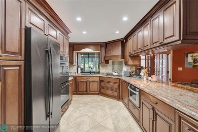Distinctively Designed Total Custom 5 bedrooms, 3.5 Bath located on Country Club of Coral Springs in Florida - for sale on GolfHomes.com, golf home, golf lot