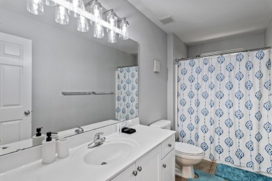 Nestled on an oversized lot, this single-level brick home in on Santa Rosa Golf and Beach Club in Florida - for sale on GolfHomes.com, golf home, golf lot