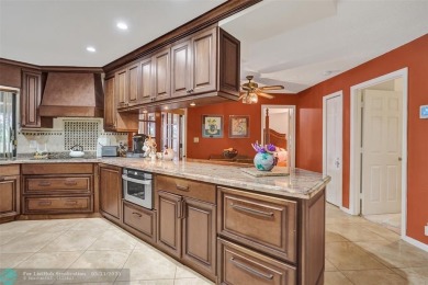 Distinctively Designed Total Custom 5 bedrooms, 3.5 Bath located on Country Club of Coral Springs in Florida - for sale on GolfHomes.com, golf home, golf lot