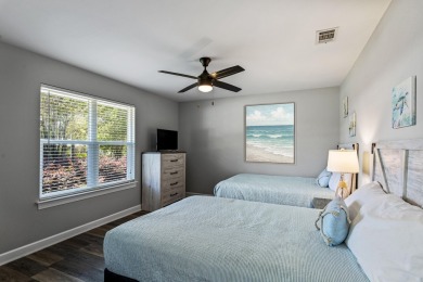 Nestled on an oversized lot, this single-level brick home in on Santa Rosa Golf and Beach Club in Florida - for sale on GolfHomes.com, golf home, golf lot