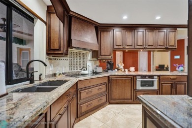 Distinctively Designed Total Custom 5 bedrooms, 3.5 Bath located on Country Club of Coral Springs in Florida - for sale on GolfHomes.com, golf home, golf lot