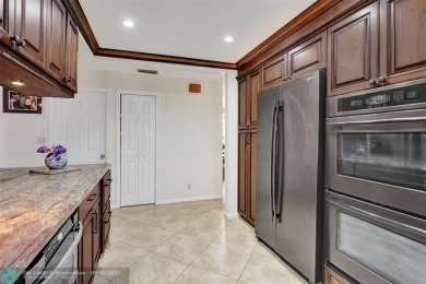 Distinctively Designed Total Custom 5 bedrooms, 3.5 Bath located on Country Club of Coral Springs in Florida - for sale on GolfHomes.com, golf home, golf lot