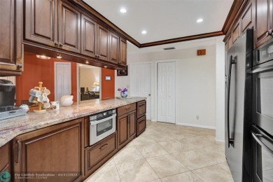 Distinctively Designed Total Custom 5 bedrooms, 3.5 Bath located on Country Club of Coral Springs in Florida - for sale on GolfHomes.com, golf home, golf lot