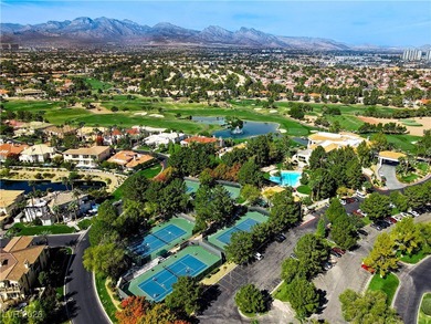 Inside exclusive gates of Canyon Gate, this elegant golf villa on Canyon Gate Country Club in Nevada - for sale on GolfHomes.com, golf home, golf lot