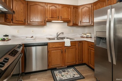 BEAUTIFUL END UNIT CONDO by the B-LINE trail that backs up to on Bloomington Country Club in Indiana - for sale on GolfHomes.com, golf home, golf lot