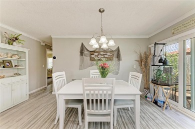Beautifully Updated Free-Standing Villa in Cambridge Village on IMG Academies Golf and Country Club in Florida - for sale on GolfHomes.com, golf home, golf lot
