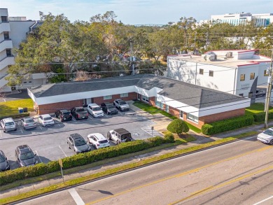 Move-in ready Class A office building on the edge of the on Belleair Country Club in Florida - for sale on GolfHomes.com, golf home, golf lot