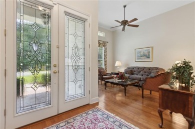Step into a world of elegance and comfort with this timeless on Laurel Island Links in Georgia - for sale on GolfHomes.com, golf home, golf lot