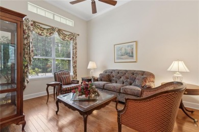Step into a world of elegance and comfort with this timeless on Laurel Island Links in Georgia - for sale on GolfHomes.com, golf home, golf lot