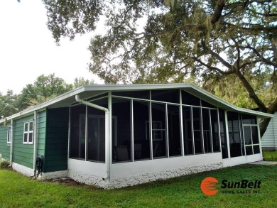 Totally renovated home on the golf course with golf cart on Rolling Greens Executive Golf Community in Florida - for sale on GolfHomes.com, golf home, golf lot