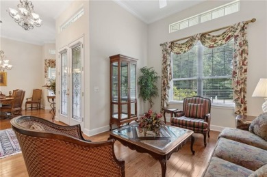Step into a world of elegance and comfort with this timeless on Laurel Island Links in Georgia - for sale on GolfHomes.com, golf home, golf lot