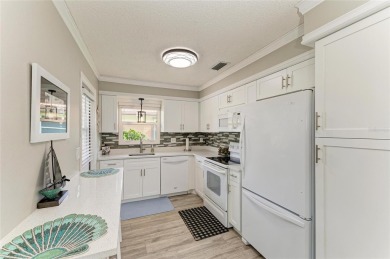 Beautifully Updated Free-Standing Villa in Cambridge Village on IMG Academies Golf and Country Club in Florida - for sale on GolfHomes.com, golf home, golf lot