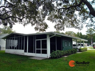 Totally renovated home on the golf course with golf cart on Rolling Greens Executive Golf Community in Florida - for sale on GolfHomes.com, golf home, golf lot