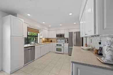 This spacious residence features 4 bedrooms, a den, and a formal on  in Florida - for sale on GolfHomes.com, golf home, golf lot