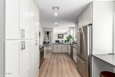 BEAUTIFUL REMODELED HOME ON THE GOLF COURSE! This renovated gem on Sun City Lakes West and East in Arizona - for sale on GolfHomes.com, golf home, golf lot