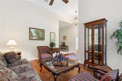 Step into a world of elegance and comfort with this timeless on Laurel Island Links in Georgia - for sale on GolfHomes.com, golf home, golf lot