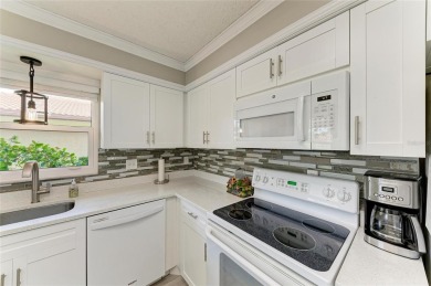 Beautifully Updated Free-Standing Villa in Cambridge Village on IMG Academies Golf and Country Club in Florida - for sale on GolfHomes.com, golf home, golf lot