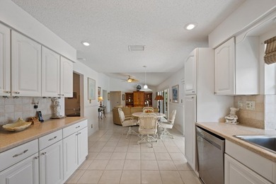 This spacious residence features 4 bedrooms, a den, and a formal on  in Florida - for sale on GolfHomes.com, golf home, golf lot