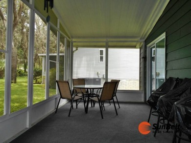 Totally renovated home on the golf course with golf cart on Rolling Greens Executive Golf Community in Florida - for sale on GolfHomes.com, golf home, golf lot
