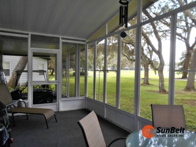 Totally renovated home on the golf course with golf cart on Rolling Greens Executive Golf Community in Florida - for sale on GolfHomes.com, golf home, golf lot