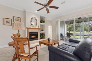 Step into a world of elegance and comfort with this timeless on Laurel Island Links in Georgia - for sale on GolfHomes.com, golf home, golf lot