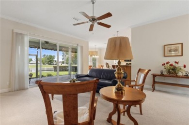 Step into a world of elegance and comfort with this timeless on Laurel Island Links in Georgia - for sale on GolfHomes.com, golf home, golf lot