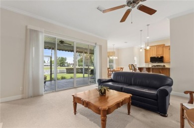 Step into a world of elegance and comfort with this timeless on Laurel Island Links in Georgia - for sale on GolfHomes.com, golf home, golf lot