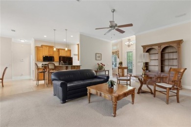 Step into a world of elegance and comfort with this timeless on Laurel Island Links in Georgia - for sale on GolfHomes.com, golf home, golf lot