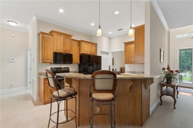 Step into a world of elegance and comfort with this timeless on Laurel Island Links in Georgia - for sale on GolfHomes.com, golf home, golf lot