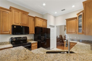 Step into a world of elegance and comfort with this timeless on Laurel Island Links in Georgia - for sale on GolfHomes.com, golf home, golf lot